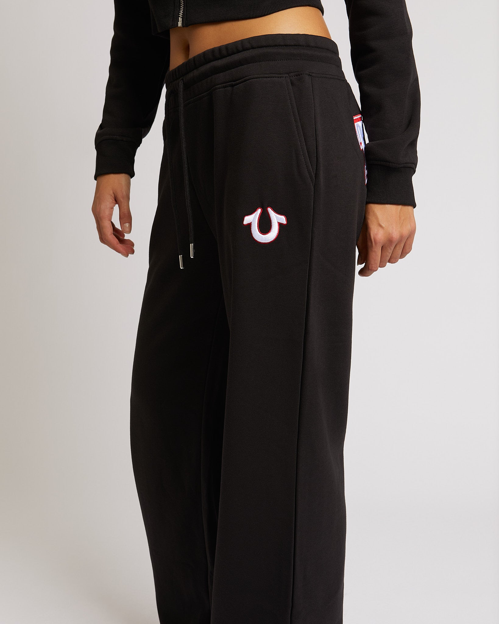 EMBROIDERED CINCHED SWEATPANTS - JET BLACK