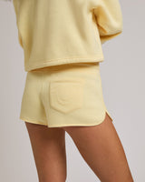 ZIP PKT DOLPHIN HEM HOT SHORTS - DOUBLE CREAM