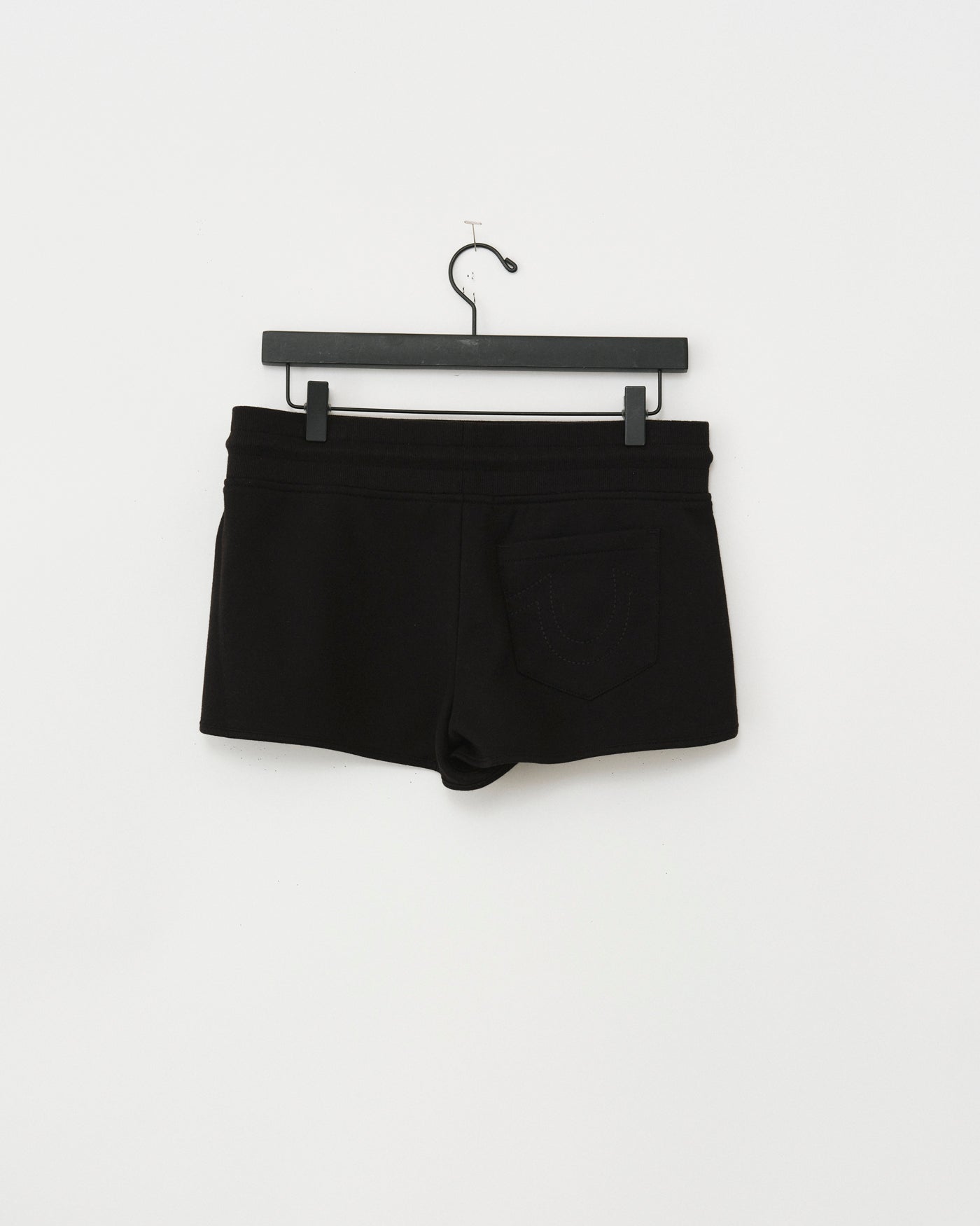 ZIP PKT DOLPHIN HEM HOT SHORTS - JET BLACK