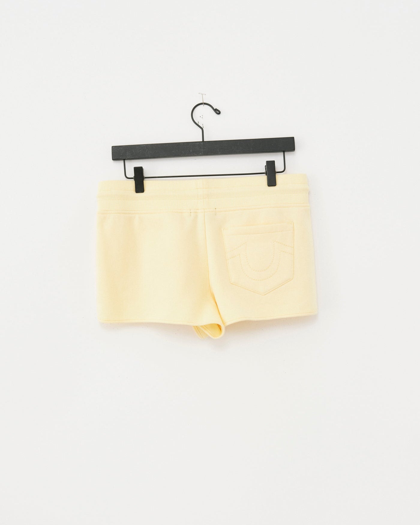 ZIP PKT DOLPHIN HEM HOT SHORTS - DOUBLE CREAM