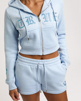 EMBROIDERED SHRUNKN ZIP HOODIE - CASHMERE BLUE
